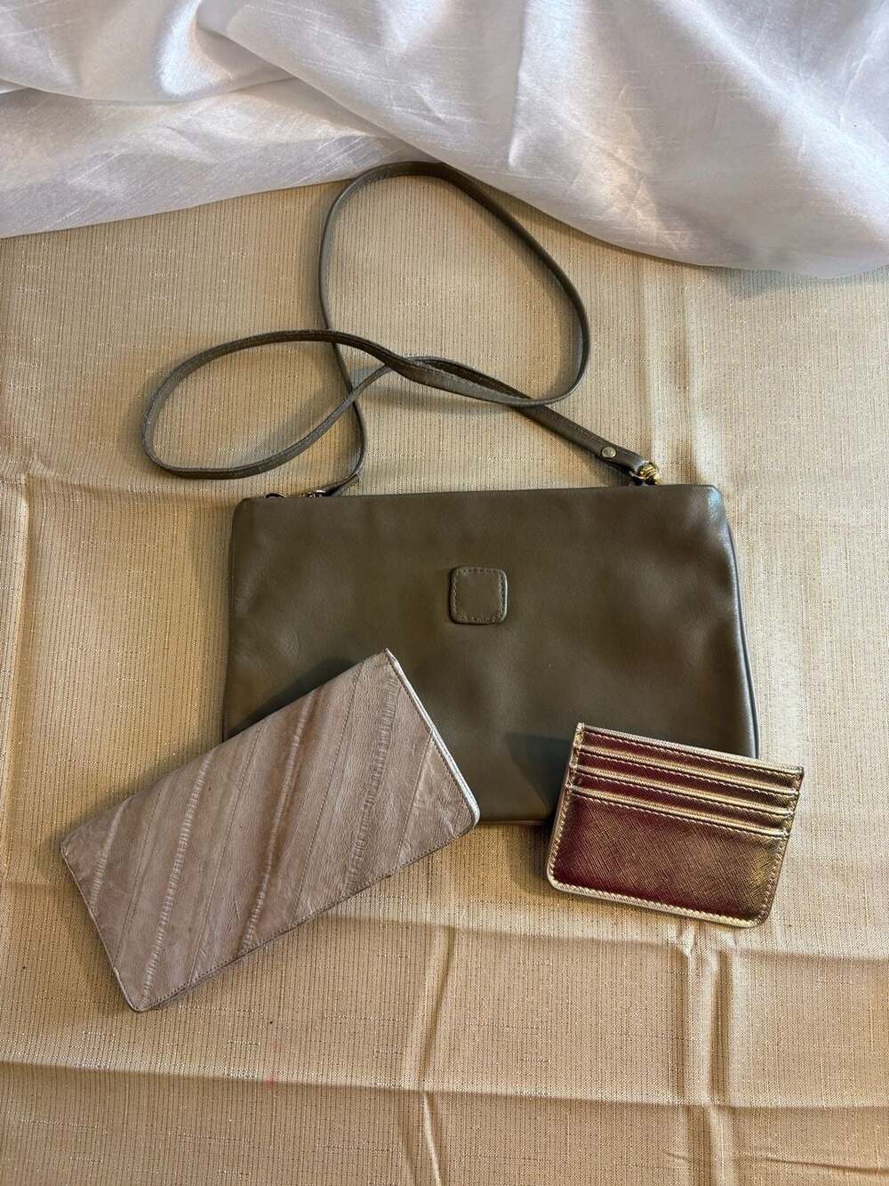 Neutral Leather Crossbody Bag, Eel Skin Wallet, and Metallic Card Holder Set